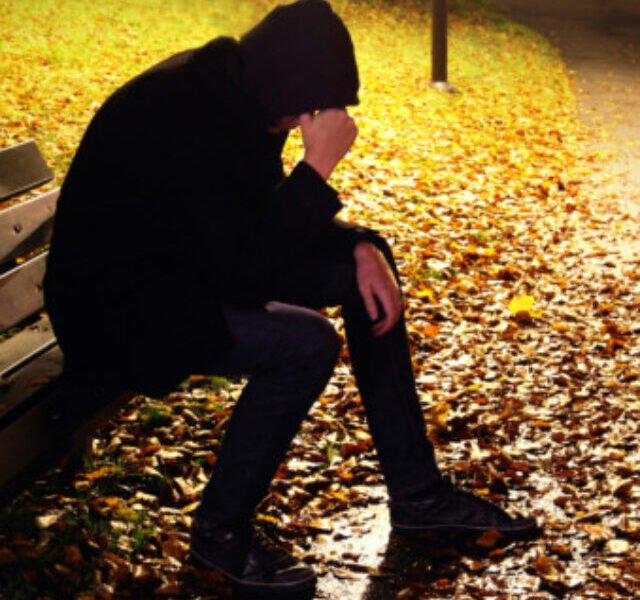 Depressed Man On Bench