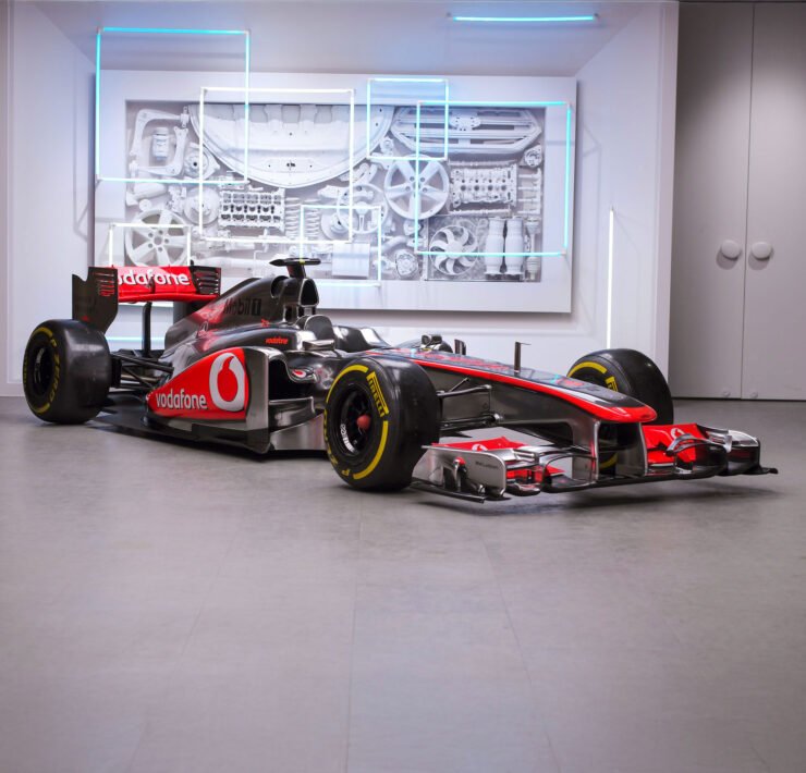 F1 Authentics auction, Best of British F1 memorabilia, McLaren MP4-26 Show Car sale, Max Verstappen 2022 race suit, Michael Schumacher Ferrari gloves, Charles Leclerc race-used boots, Formula 1 collectible auction, Rare F1 memorabilia for sale, British Grand Prix auction 2025, Official F1 merchandise