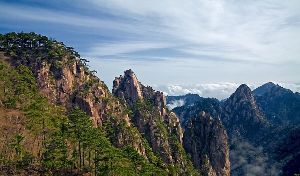 China hill stations, Huangshan travel guide, Zhangjiajie costs, Lijiang Old Town food, Jiuzhaigou accommodation, Mount Emei pilgrimage, China mountain towns travel, hill stations in china