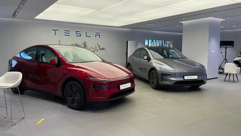 Tesla showroom Delhi Aerocity, Tesla India expansion 2025, Tesla Model Y price India, Tesla Supercharger Delhi NCR, Tesla charging network India, Tesla V4 Supercharger range, Tesla Model Y variants India, Tesla EV showroom locations, Tesla Destination Charging India, Tesla Aerocity Delhi launch