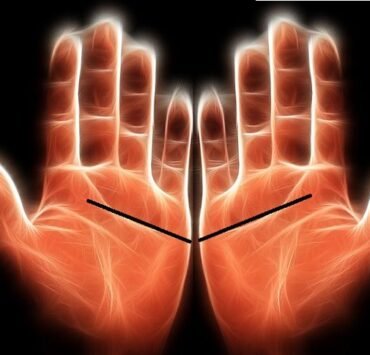 half moon on palm, lunule meaning, palmistry symbols, palm reading, hand crescent mark, spiritual meaning of lunule, health and half-moon, personality traits palmistry